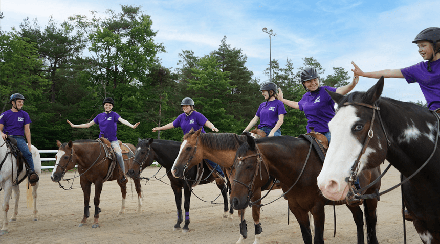 Young girl on a horse in our equestrian center